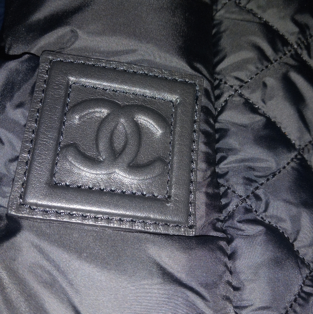 Chanel tote bag. Black and burgundy on the inside.